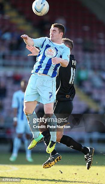 John Fleck of Coventry City rises to head the ball during the Sky Bet League One match between Coventry City and Port Vale at Sixfields Stadium on...