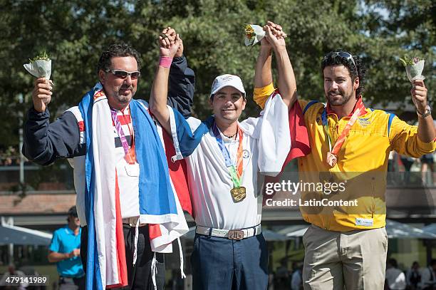 Marcos Ruiz of Paraguay, Silver medal, Felipe Aguilar of Chile, Gold medal and Jose Garrido of Colombia, Bronze medal, pose in the final round of...