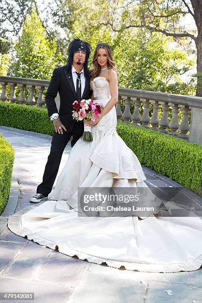 Nikki Sixx and Courtney Sixx pose for portraits during their wedding at Greystone Mansion on March 15, 2014 in Beverly Hills, California.