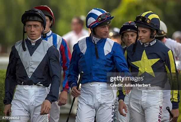 Jockeys Shane Kelly, Dane O' Neill and William Buick head out to ride in the 19.45; The 32Red Casino Handicap Stakes Race run at Kempton Park...