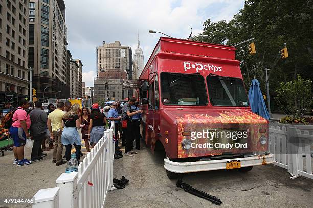 General view of atmosphere during the popchips Crazy Hot BBQ hosted by Ali Larter for the FDNY at Flatiron Plaza on July 1, 2015 in New York City.