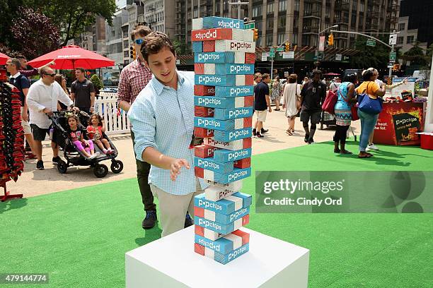 General view of atmosphere during the popchips Crazy Hot BBQ hosted by Ali Larter for the FDNY at Flatiron Plaza on July 1, 2015 in New York City.