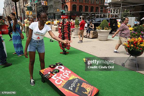 General view of atmosphere during the popchips Crazy Hot BBQ hosted by Ali Larter for the FDNY at Flatiron Plaza on July 1, 2015 in New York City.