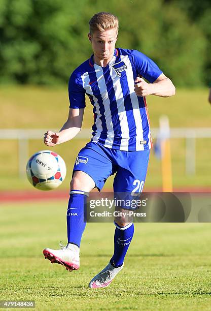 Mitchell Weiser of Hertha BSC shoots the ball during the game between dem 1. FC Luebars and Hertha BSC on July 1, 2015 in Berlin, Germany.