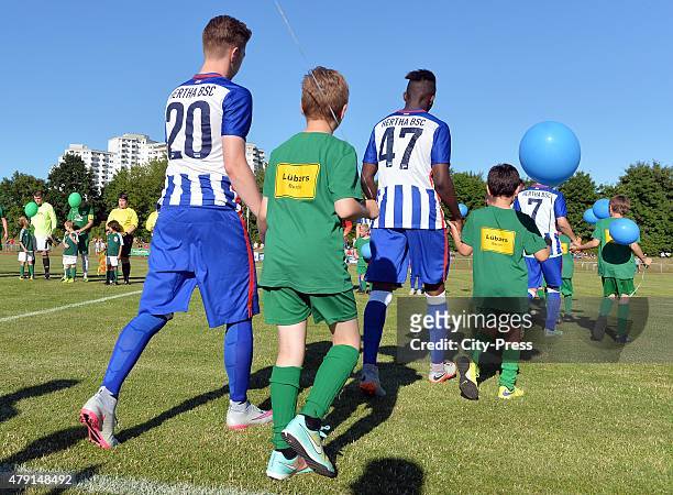 Mitchell Weiser and Jordan Torunarigha of Hertha BSC enter the pitch during the game between dem 1. FC Luebars and Hertha BSC on July 1, 2015 in...
