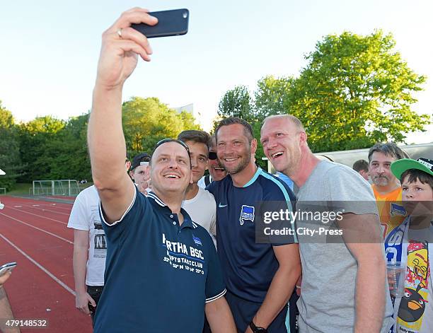 Coach Pal Dardai of Hertha BSC with fans during the game between dem 1. FC Luebars and Hertha BSC on July 1, 2015 in Berlin, Germany.