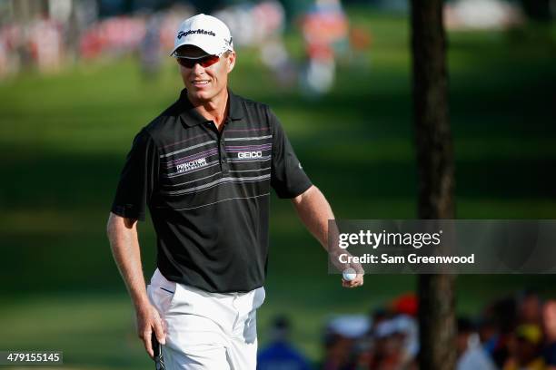 John Senden of Australia looks on from the 18th green during the final round of the Valspar Championship at Innisbrook Resort and Golf Club on March...