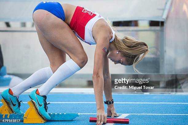 Isidora Jimenez of Chile gets ready for the Women's 4x400 relay during day ten of the X South American Games Santiago 2014 at Estadio Nacional on...