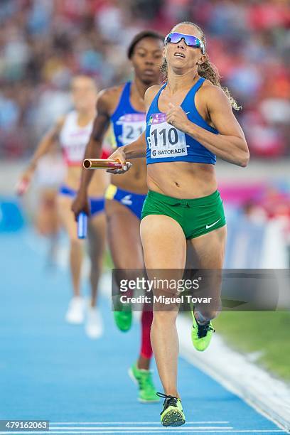 Geisa Muniz of Brazil competes in Women's 4x400 relay event during day ten of the X South American Games Santiago 2014 at Estadio Nacional on March...