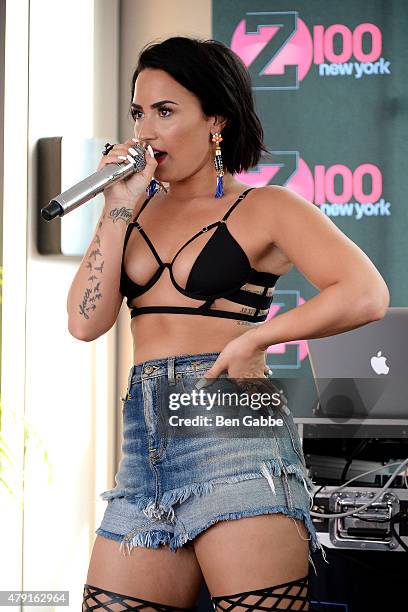 Singer-songwriter Demi Lovato performs during Demi Lovato's Debut of her New Single, "Cool for the Summer," with Z100 at Gansevoort Park Avenue on...