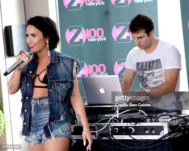 Singer-songwriter Demi Lovato performs during Demi Lovato's Debut of her New Single, "Cool for the Summer," with Z100 at Gansevoort Park Avenue on...