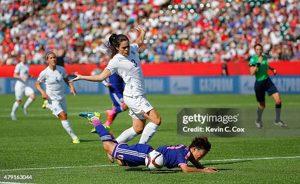 Claire Rafferty of England fouls Saori Ariyoshi of Japan to concede a penalty during the FIFA Women's World Cup Semi Final match between Japan and...