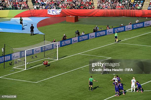 Fara Williams of England scores from the penalty spot despite the best efforts of Ayumi Kaihori of Japan during the FIFA Women's World Cup 2015 Semi...