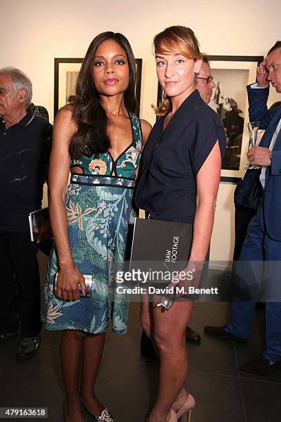 Naomie Harris and Octavia Coates attend a private view of "Raw Footage" at The Opera Gallery on July 1, 2015 in London, England.