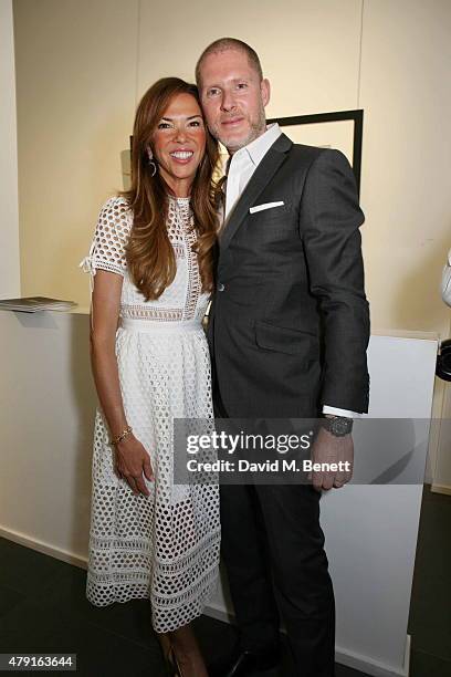 Heather Kerzner and Jean-David Malat attend a private view of "Raw Footage" at The Opera Gallery on July 1, 2015 in London, England.