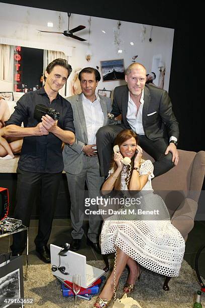 Lawrence Bender, Alexander Barani, Heather Kerzner and Jean-David Malat attend a private view of "Raw Footage" at The Opera Gallery on July 1, 2015...