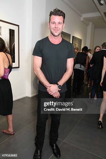 Paul Solomons attends a private view of "Raw Footage" at The Opera Gallery on July 1, 2015 in London, England.