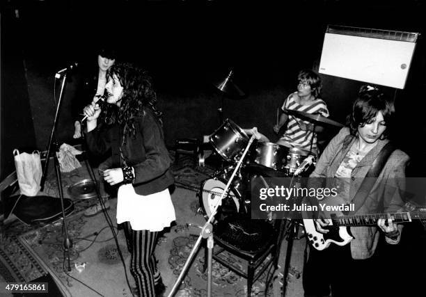 British punk group The Slits rehearsing in the basement at 6 Surrendale Place, Maida Vale, London, 1977. Left to right: Tessa Pollitt, Ari Up ,...