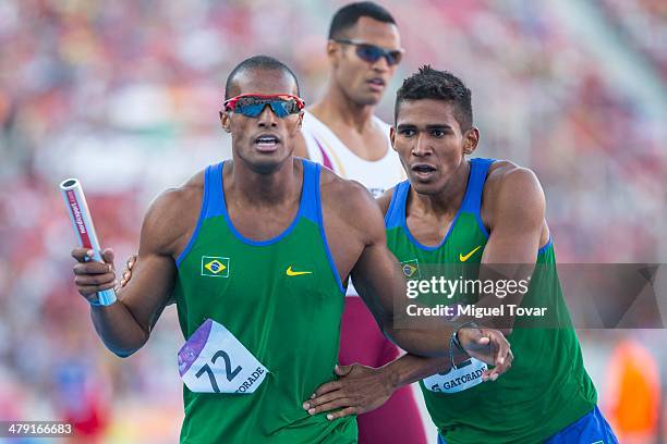 Anderson Freitas Henriques of Brazil crosses the finish line of Men's 4x400 relay during day ten of the X South American Games Santiago 2014 at...