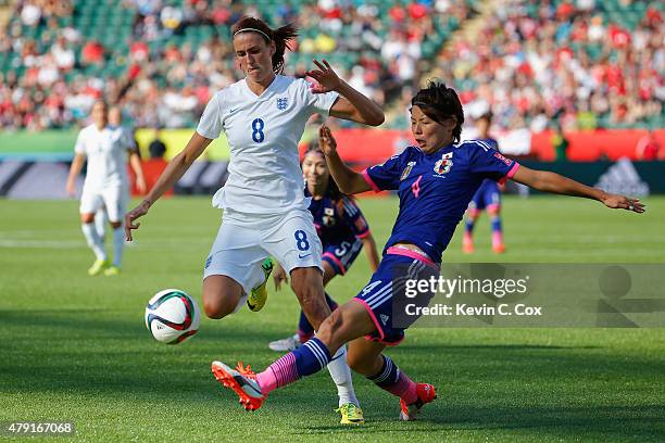 Jill Scott of England battles Saki Kumagai of Japan in action during the FIFA Women's World Cup Semi Final match between Japan and England at the...