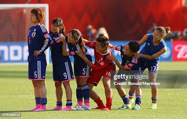 Mizuho Sakaguchi, Nahomi Kawasumi, Aya Sameshima, Ayumi Kaihori, Saori Ariyoshi and Yuki Ogimi of Japan celebrate after the FIFA Women's World Cup...