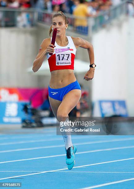 Isidora Jimenez of Chile competes in Women's 4x400 relay on day ten of the X South American Games Santiago 2014 at Estadio Nacional on March 15, 2014...