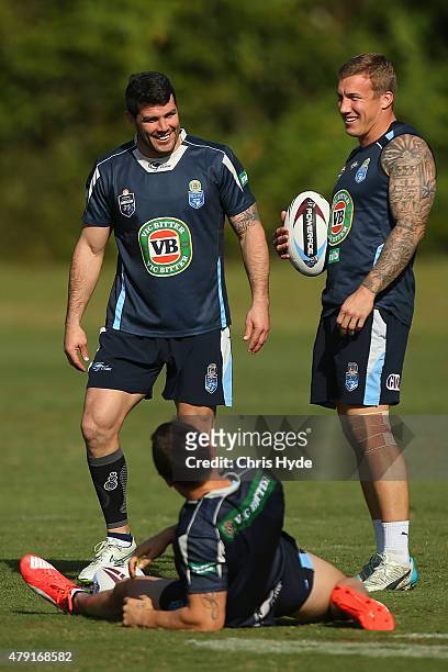 Michael Ennis and Trent Hodkinson smile during a New South Wales State of Origin training session at Novotel Coffs Harbour on July 2, 2015 in Coffs...