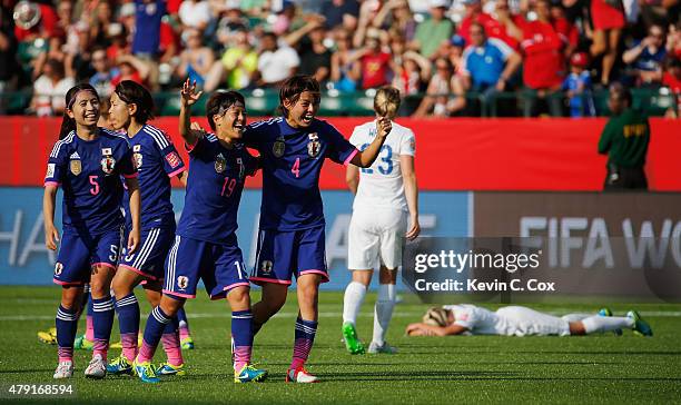 Saori Ariyoshi and Saki Kumagai of Japan celebrate after the FIFA Women's World Cup Semi Final match between Japan and England at the Commonwealth...