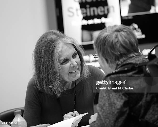 Author Gloria Steinem signs copies of her newest book during BookExpo America held at the Javits Center on May 29, 2015 in New York City.