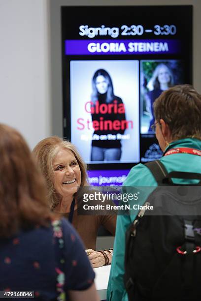 Author Gloria Steinem signs copies of her newest book during BookExpo America held at the Javits Center on May 29, 2015 in New York City.