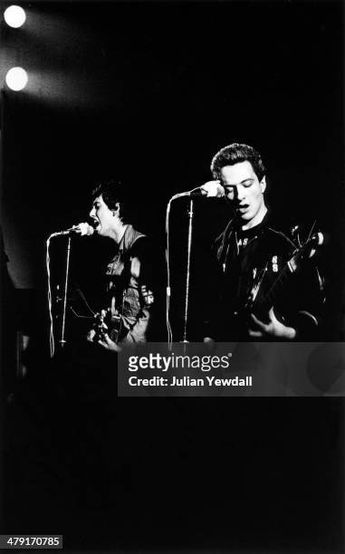 Guitarist Mick Jones and singer Joe Strummer performing with British punk group The Clash at the Coliseum, Harlesden, London, 11th March 1977.