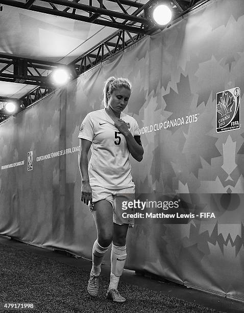 Steph Houghton of England walks down the tunnel, after her team lost to Japan during the FIFA Women's World Cup 2015 Semi Final match between Japan...