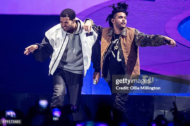 Drake and The Weeknd perform onstage during a date of Drakes "Nothing Was the Same" 2014 World Tour at Nottingham Capital FM Arena on March 16, 2014...