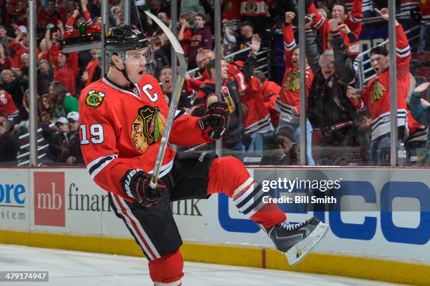 Jonathan Toews of the Chicago Blackhawks celebrates after scoring against the Detroit Red Wings in the third period during the NHL game on March 16,...