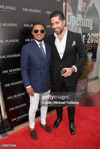 Blogger Anish Bhatt and jewelry designer Anil Arjandas attend the grand opening of the Anil Arjandas Jewels Los Angeles Boutique on July 1, 2015 in...