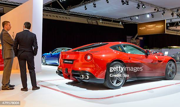 ferrari f12 berlinetta v12 gt sports car rear view - ferrari car stock pictures, royalty-free photos & images