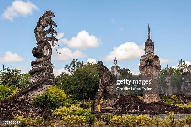 Fantasy Buddhist and Hindu statues at Sala Kaew Ku, a park built by Luang Pu Bunleua Sulilat, a mystic and cult leader, outside the Mekong River town...