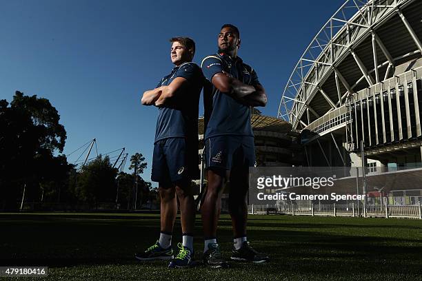 Drew Mitchell of the Wallabies and Taqele Naiyaravoro of the Wallabies poses during the Australian Wallabies squad announcemnt at ANZ Stadium on July...