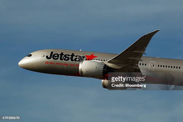 An aircraft of Jetstar Airways, the budget arm of Qantas Airways Ltd., takes off at Sydney Airport in Sydney, Australia's central bank reiterated the...