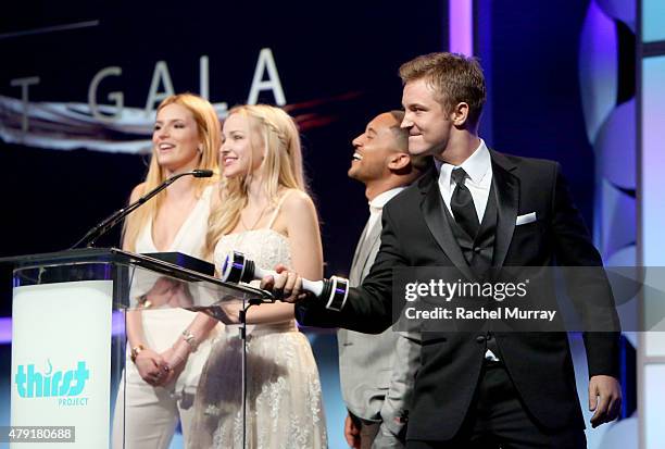 Actors Bella Thorne, Dove Cameron, Tahj Mowry and Michael Welch speak onstage during the 6th Annual Thirst Gala at The Beverly Hilton Hotel on June...