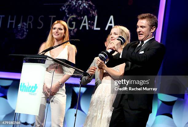 Actors Bella Thorne, Dove Cameron, and Michael Welch speak onstage during the 6th Annual Thirst Gala at The Beverly Hilton Hotel on June 30, 2015 in...