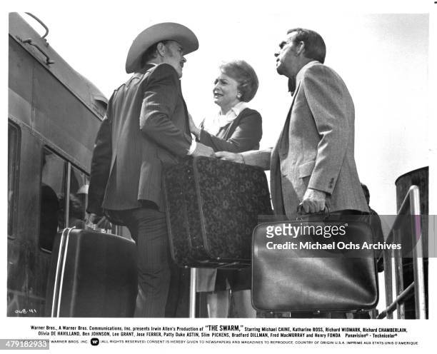 Actress Olivia de Havilland and actor Fred MacMurray in a scene from the Warner Bros. Movie "The Swarm" circa 1978.