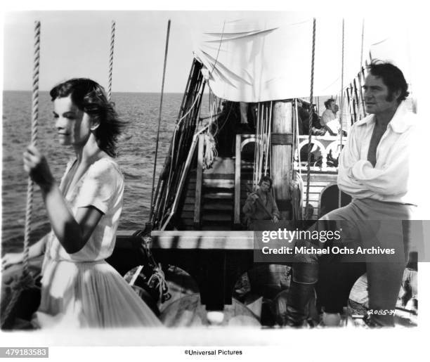 Actress Genevieve Bujold and actor Robert Shaw in a scene from the Universal Pictures movie "Swashbuckler" circa 1976.