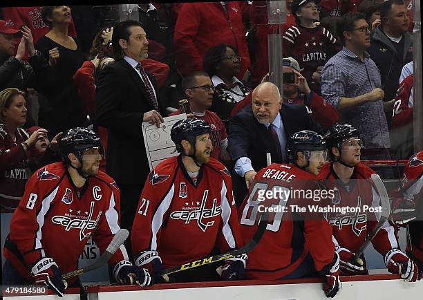 Washington Capitals head coach Barry Trotz talks to his bench during the third period of Game 7 of the Eastern Conference Quarterfinals between the...