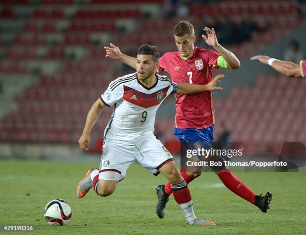 Kevin Volland of Germany with Goran Causic of Serbia during the UEFA European Under-21 Group A match between Germany and Serbia at Letna Stadium on...