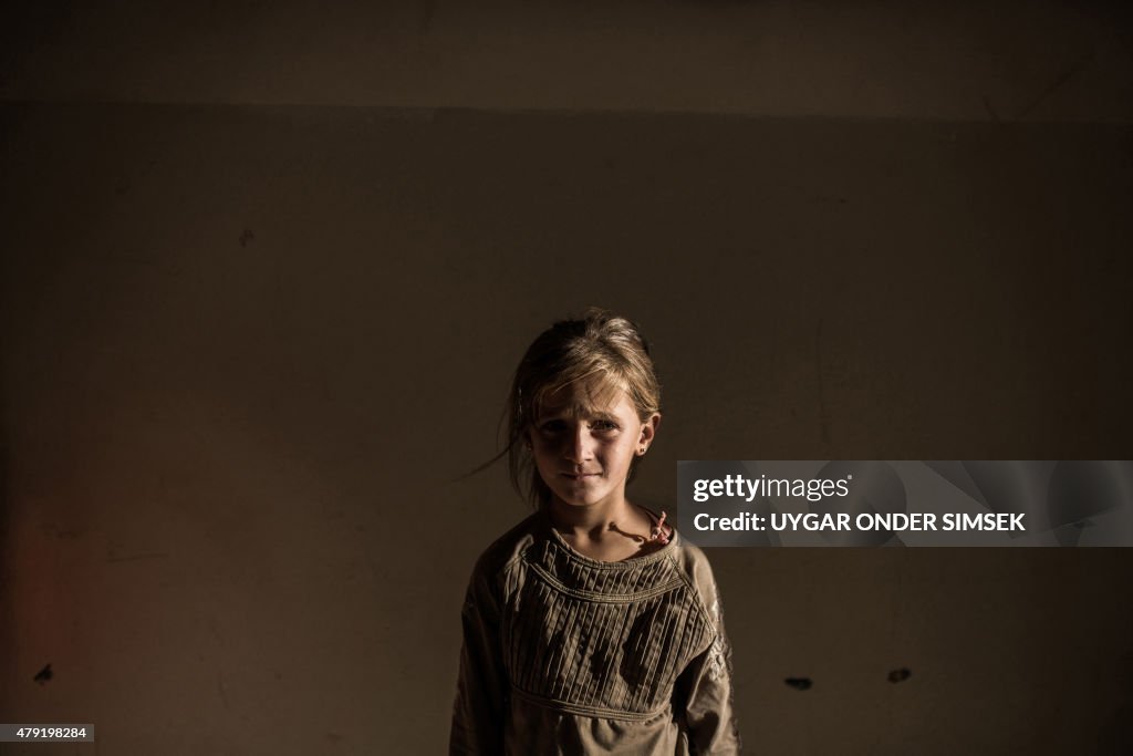 TOPSHOT-SYRIA-KURDS-REFUGESS