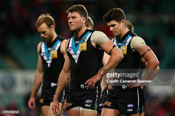 Brad Ebert of the Power and team mates look dejected after losing the round 14 AFL match between the Sydney Swans and the Port Adelaide Power at SCG...