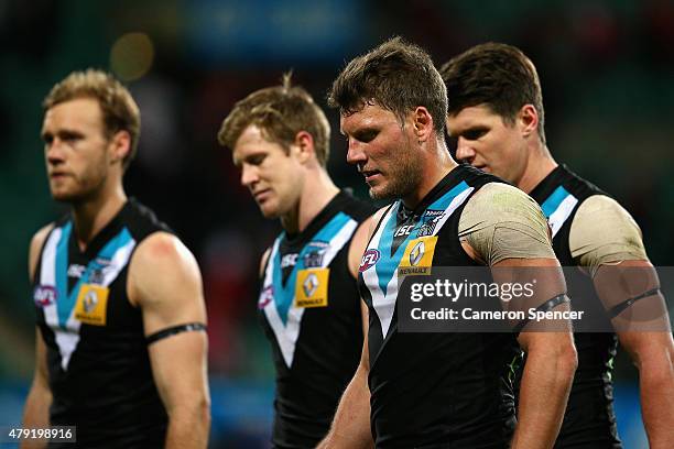 Brad Ebert of the Power and team mates look dejected after losing the round 14 AFL match between the Sydney Swans and the Port Adelaide Power at SCG...