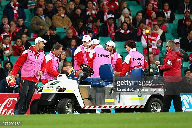 Ted Richards of the Swans is stretchered from the field during the round 14 AFL match between the Sydney Swans and the Port Adelaide Power at SCG on...