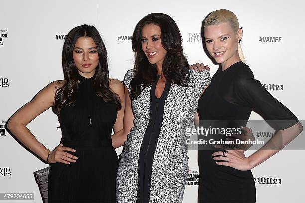 Models Jessica Gomes, Megan Gale and Montana Cox pose as they arrive for the 2014 Virgin Australia Melbourne Fashion Festival Opening Event presented...
